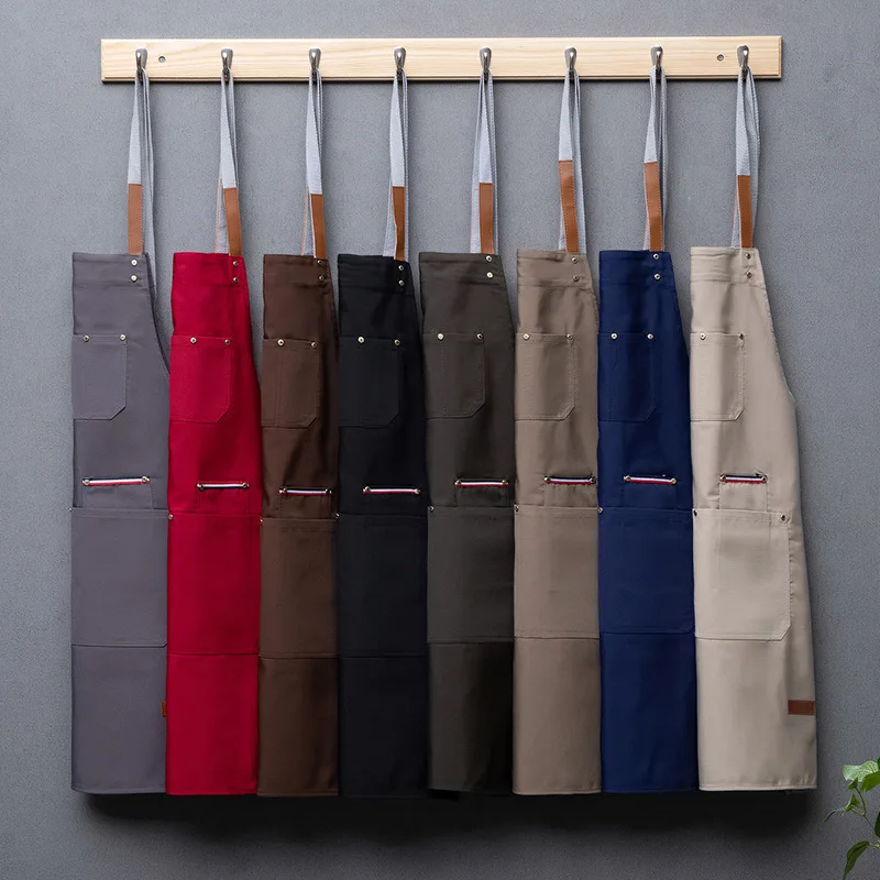Solid Color Canvas Apron with Printed Embroidery Logo Waterproof Oil Proof Work Shoulder Strap for Nail Salon And Kitchen
Solid Color Canvas Apron with Printed Embroidery Logo Waterproof Oil Proof Work Shoulder Strap for Nail Salon And Kitchen