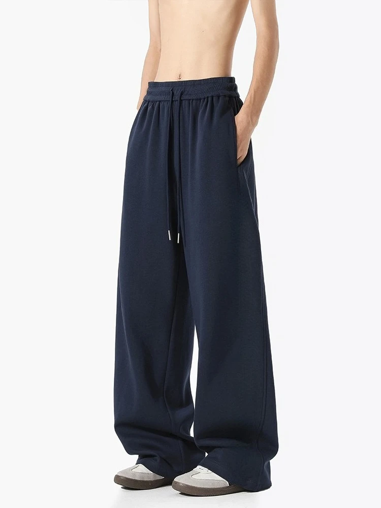 Серые спортивные штаны с белым цветком, мужские осенние американские тяжелые свободные прямые брюки, универсальные повседневные спортивные брюки
Серые спортивные штаны с белым цветком, мужские осенние американские тяжелые свободные прямые брюки, универсальные повседневные спортивные брюки