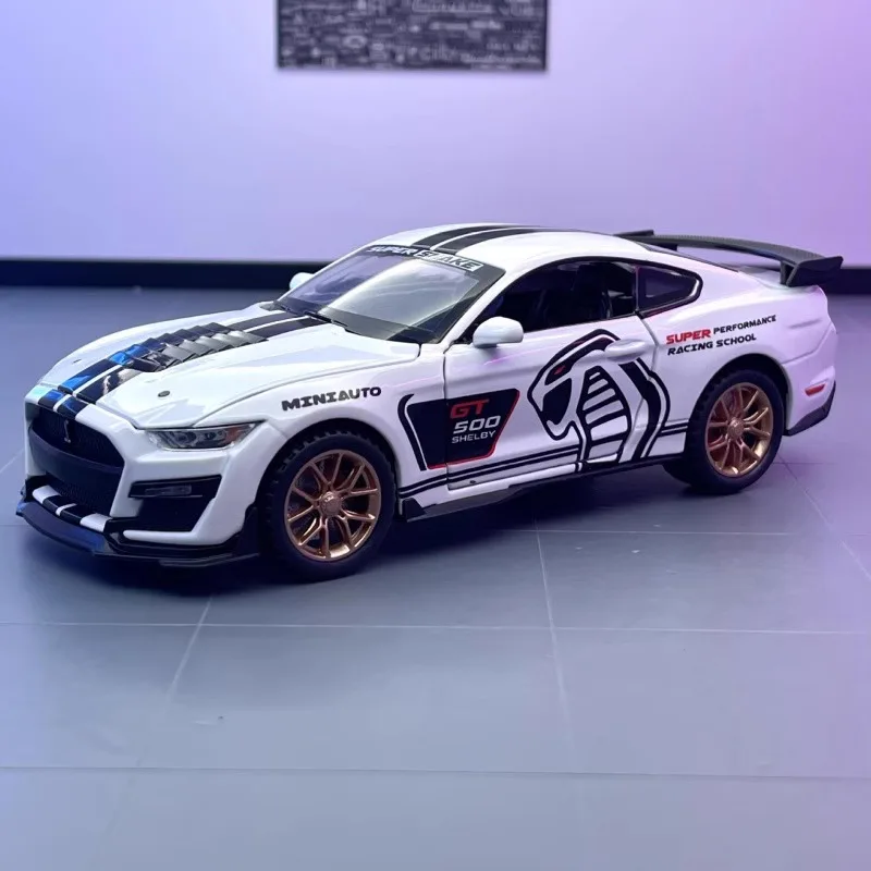 Модель Ford Mustang Viper GT500 в масштабе 1:32, литой автомобиль из сплава, декоративные модные украшения, украшения для компьютерного стола, подарок для мальчиков
Модель Ford Mustang Viper GT500 в масштабе 1:32, литой автомобиль из сплава, декоративные модные украшения, украшения для компьютерного стола, подарок для мальчиков