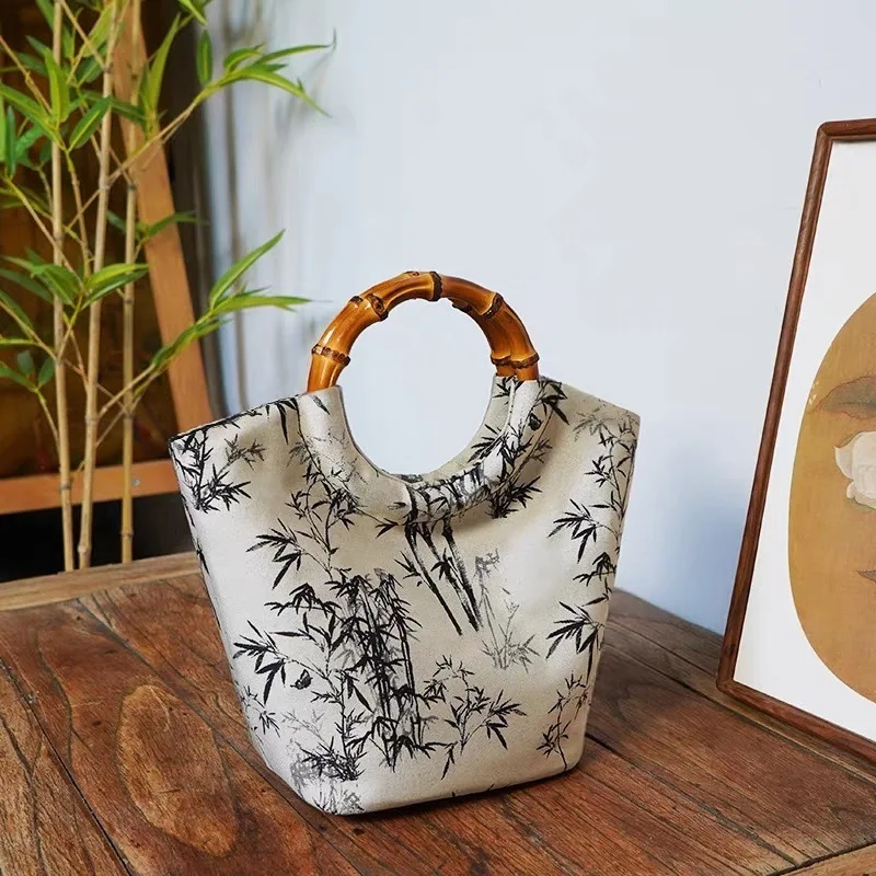 Chinese-style artistic bamboo jacquard round handle handbag, new Chinese casual fairy cloth bag, versatile
Chinese-style artistic bamboo jacquard round handle handbag, new Chinese casual fairy cloth bag, versatile