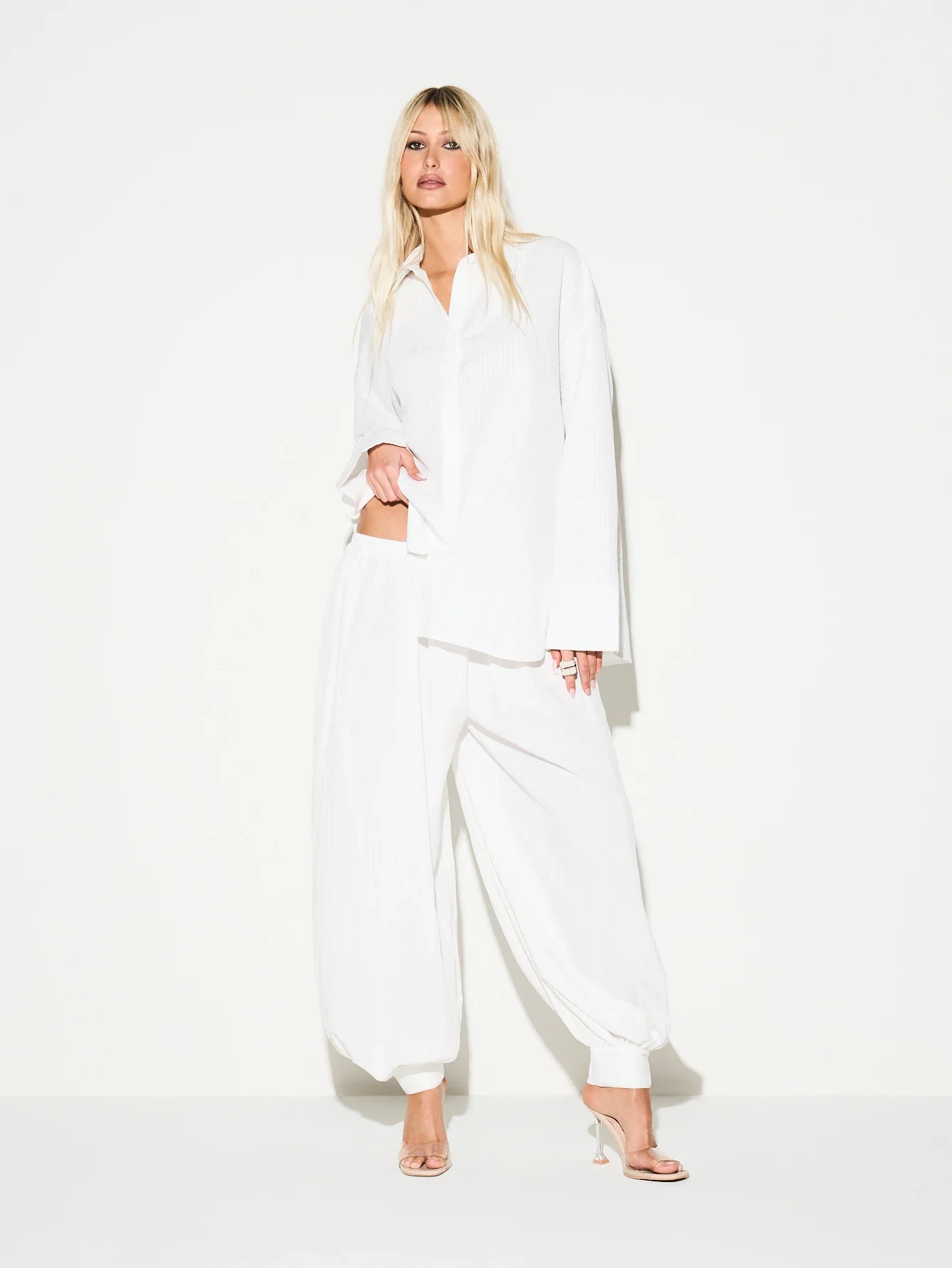 Seersucker Striped Balloon Wide Leg High Rise Palazzo Pants With Elastic Cinched Ankle Cuffs
Seersucker Striped Balloon Wide Leg High Rise Palazzo Pants With Elastic Cinched Ankle Cuffs