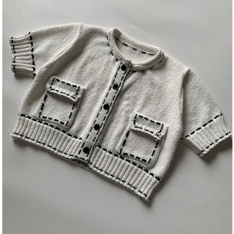 Dave&Di Minimalist Stitching Decoration White Knitted Jacket Single Breasted Cardigan Short Top Sweaters Women
Dave&Di Minimalist Stitching Decoration White Knitted Jacket Single Breasted Cardigan Short Top Sweaters Women