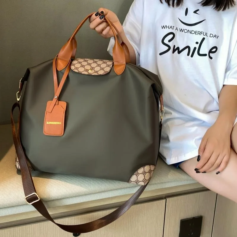 New Fitness Bag Casual Fashion Portable Dance Large Bag Men and Women Folding Storage Travel Swimming Business Travel Handbags
New Fitness Bag Casual Fashion Portable Dance Large Bag Men and Women Folding Storage Travel Swimming Business Travel Handbags