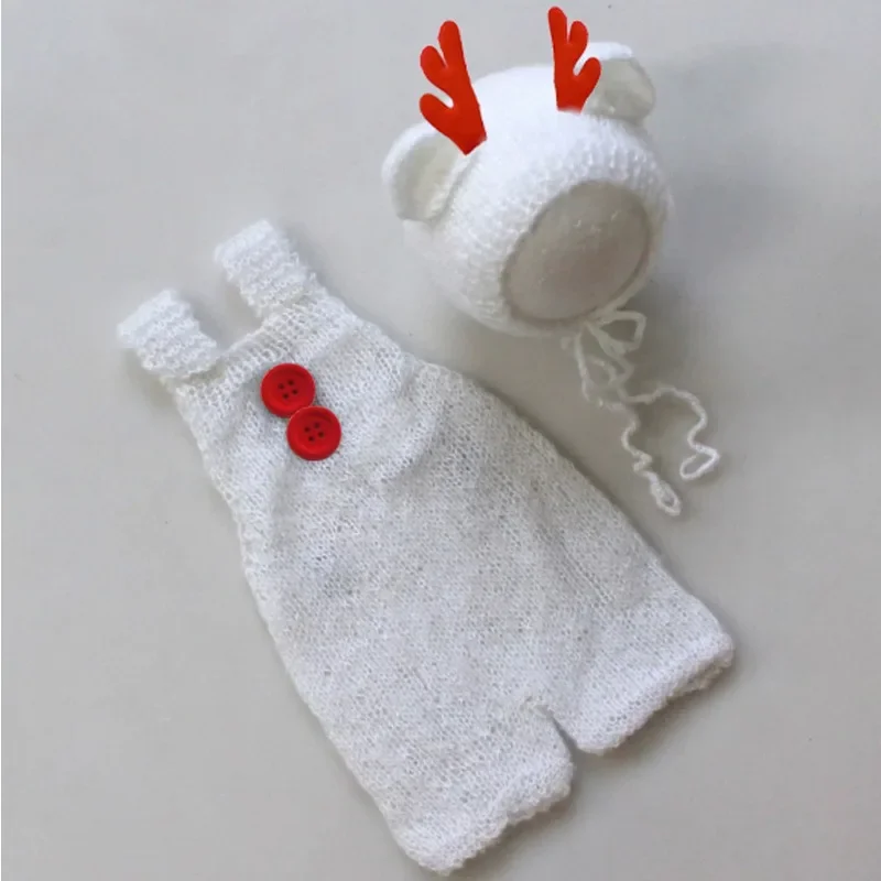 Набор для детской рождественской фотосессии - комплект из 2 предметов, вязанные крючком подтяжки с медведем и шапочка из мохера - вязаный костюм для новорожденного для студийного реквизита
Набор для детской рождественской фотосессии - комплект из 2 предметов, вязанные крючком подтяжки с медведем и шапочка из мохера - вязаный костюм для новорожденного для студийного реквизита