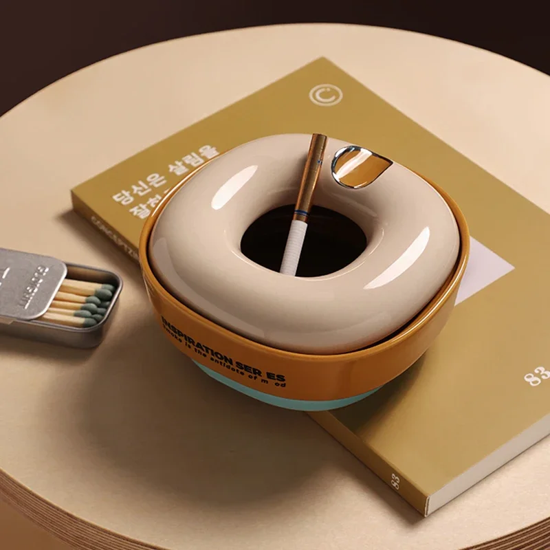 Round Ceramic Ashtray with Lid Anti-ash Flying Cigar Ashtray Office Desktop Decorations Ornaments Table Smoking Accessories.
Round Ceramic Ashtray with Lid Anti-ash Flying Cigar Ashtray Office Desktop Decorations Ornaments Table Smoking Accessories.
