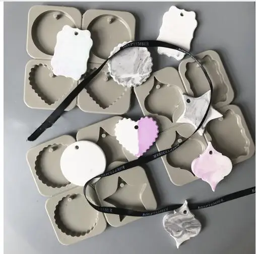 car pendant decoration four hole round heart star silicone forms aroma stone moulds silicone molds aroma wax tablets mould
car pendant decoration four hole round heart star silicone forms aroma stone moulds silicone molds aroma wax tablets mould