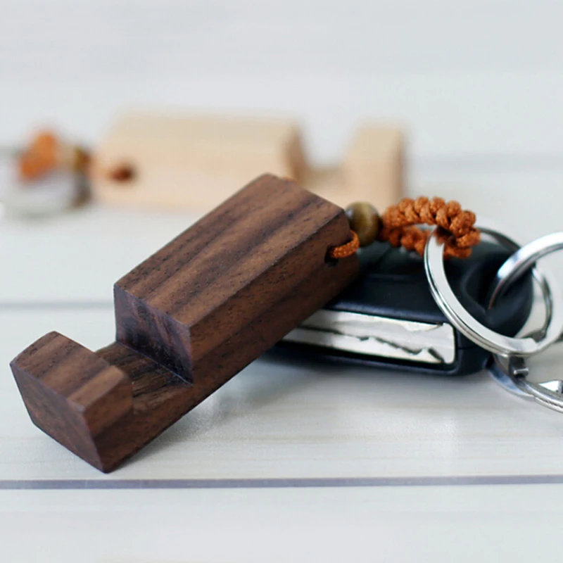 New Retro Wood Mini Phone Stand Keychain Car Keyringfashion Accessorie Phone Holder Stand Pendant Portable lightweight
New Retro Wood Mini Phone Stand Keychain Car Keyringfashion Accessorie Phone Holder Stand Pendant Portable lightweight