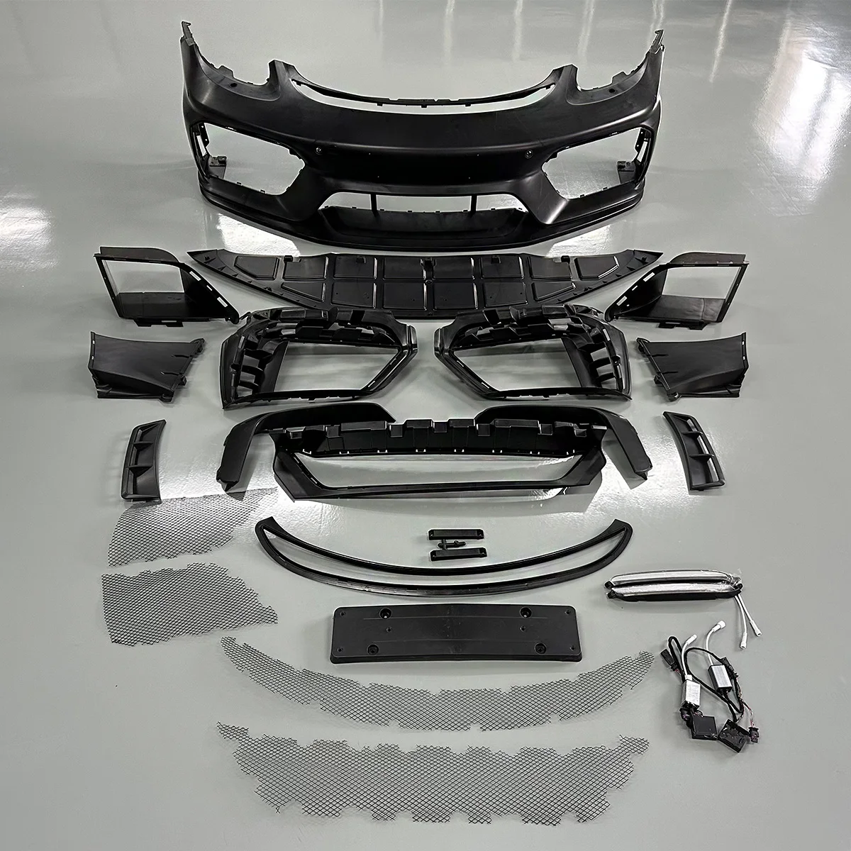 Top Quality Kit for Cayman 718/981upgrade to GT4 Model Body Kits PP Material Front Bumper Parts.
Top Quality Kit for Cayman 718/981upgrade to GT4 Model Body Kits PP Material Front Bumper Parts.