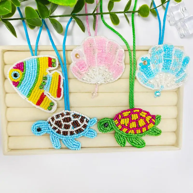 Handmade Crystal Beaded Clownfish & Turtle Shell Applique Patch with Hanging Rope
Handmade Crystal Beaded Clownfish & Turtle Shell Applique Patch with Hanging Rope