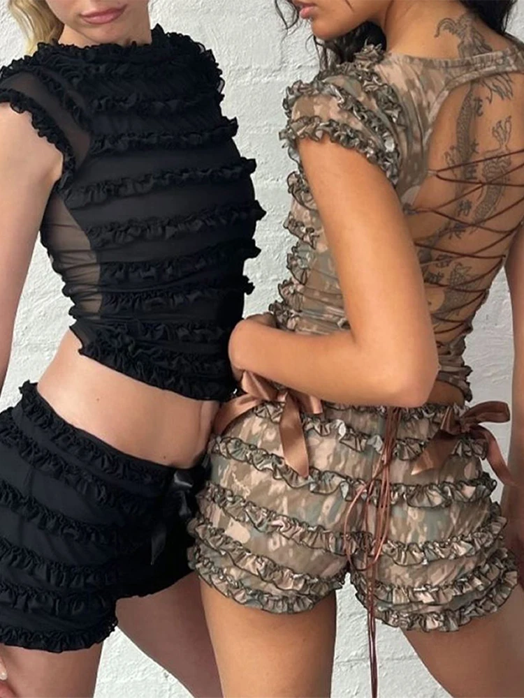 Fashion Pleated Women's Two Piece Suit O-neck Sleeveless Backless Top Loose Bow Short Pants 2025 Summer Female Causal Outfits
Fashion Pleated Women's Two Piece Suit O-neck Sleeveless Backless Top Loose Bow Short Pants 2025 Summer Female Causal Outfits