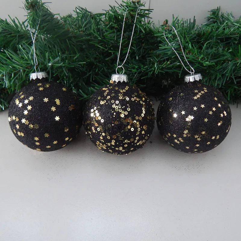 Черный рождественский стеклянный шар в виде подвески
Черный рождественский стеклянный шар в виде подвески