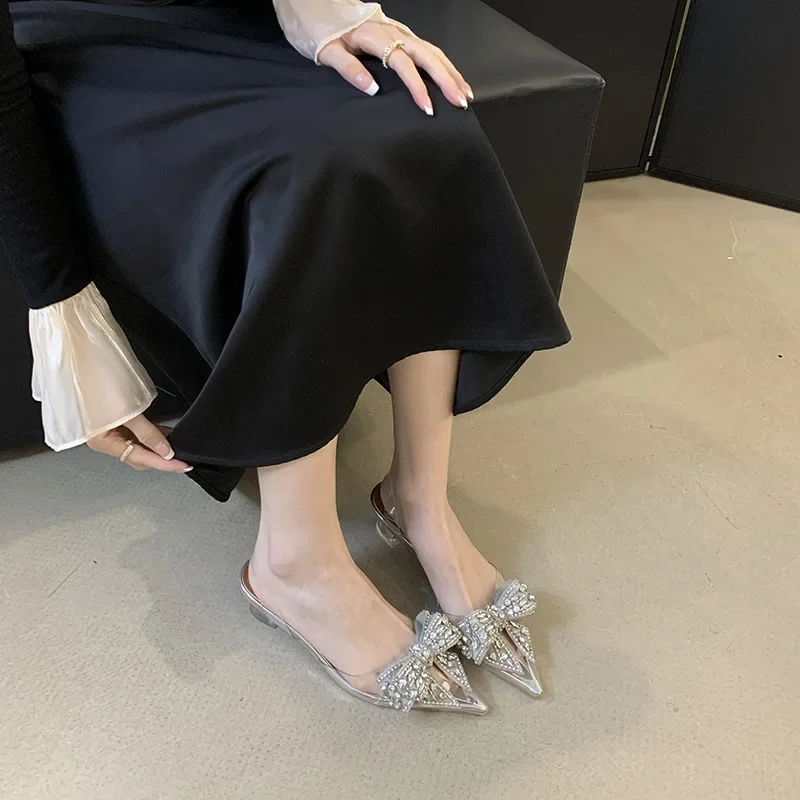 Women Pointed Toe PVC Transparent High Heels Jumpsuit With Rhinestone Bow Detail Decoration And Strap For Prom, Wedding, Party
Women Pointed Toe PVC Transparent High Heels Jumpsuit With Rhinestone Bow Detail Decoration And Strap For Prom, Wedding, Party