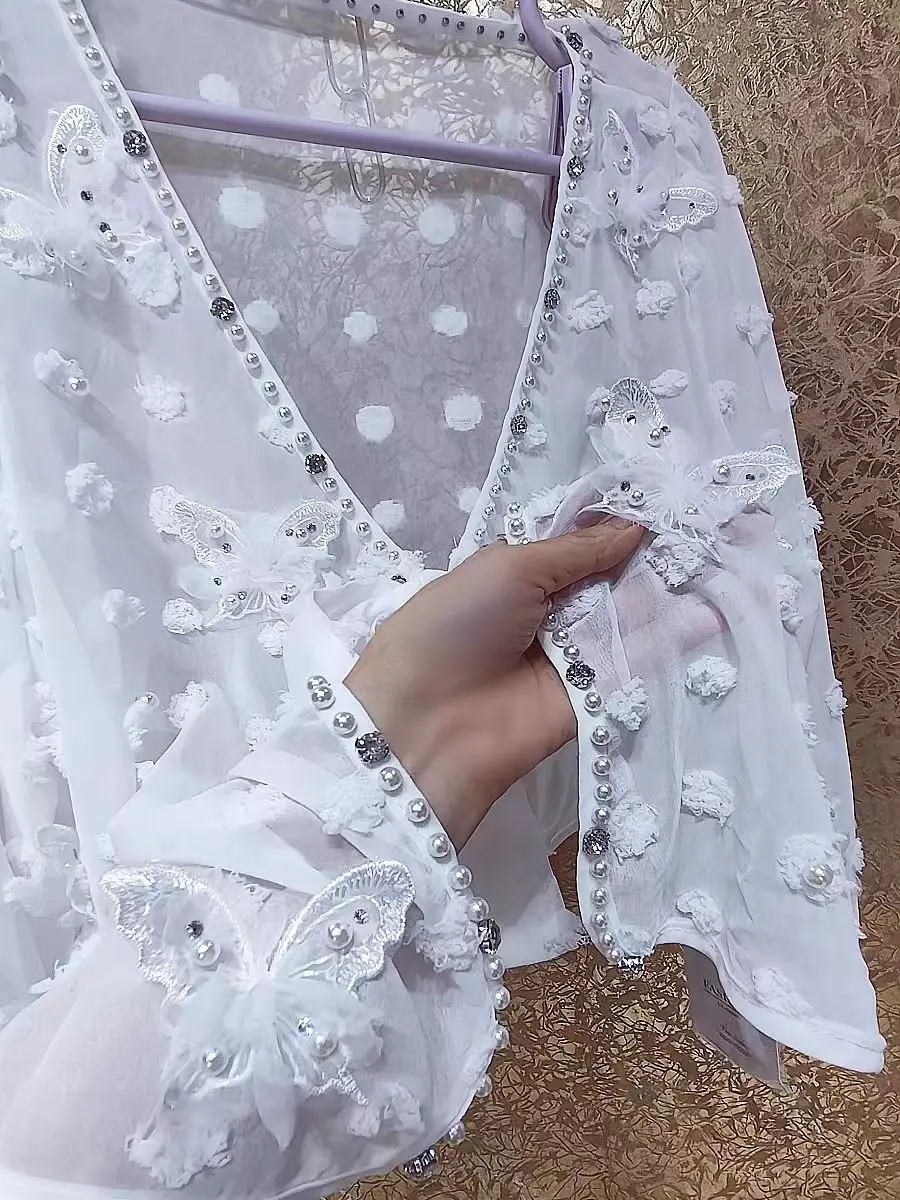 High-end Pears Beads Stitch Sweet Chic Cardigan Top For Women's Spring Summer 2025 Sunscreen Blouses Shirts Woman Clothes
High-end Pears Beads Stitch Sweet Chic Cardigan Top For Women's Spring Summer 2025 Sunscreen Blouses Shirts Woman Clothes