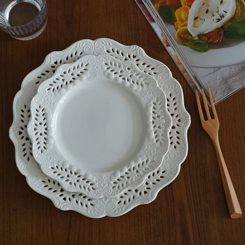 White Literary Plate European Retro Court Style Ceramic Western Food Plate Hollow Relief Flower Steak Plate Tableware
White Literary Plate European Retro Court Style Ceramic Western Food Plate Hollow Relief Flower Steak Plate Tableware