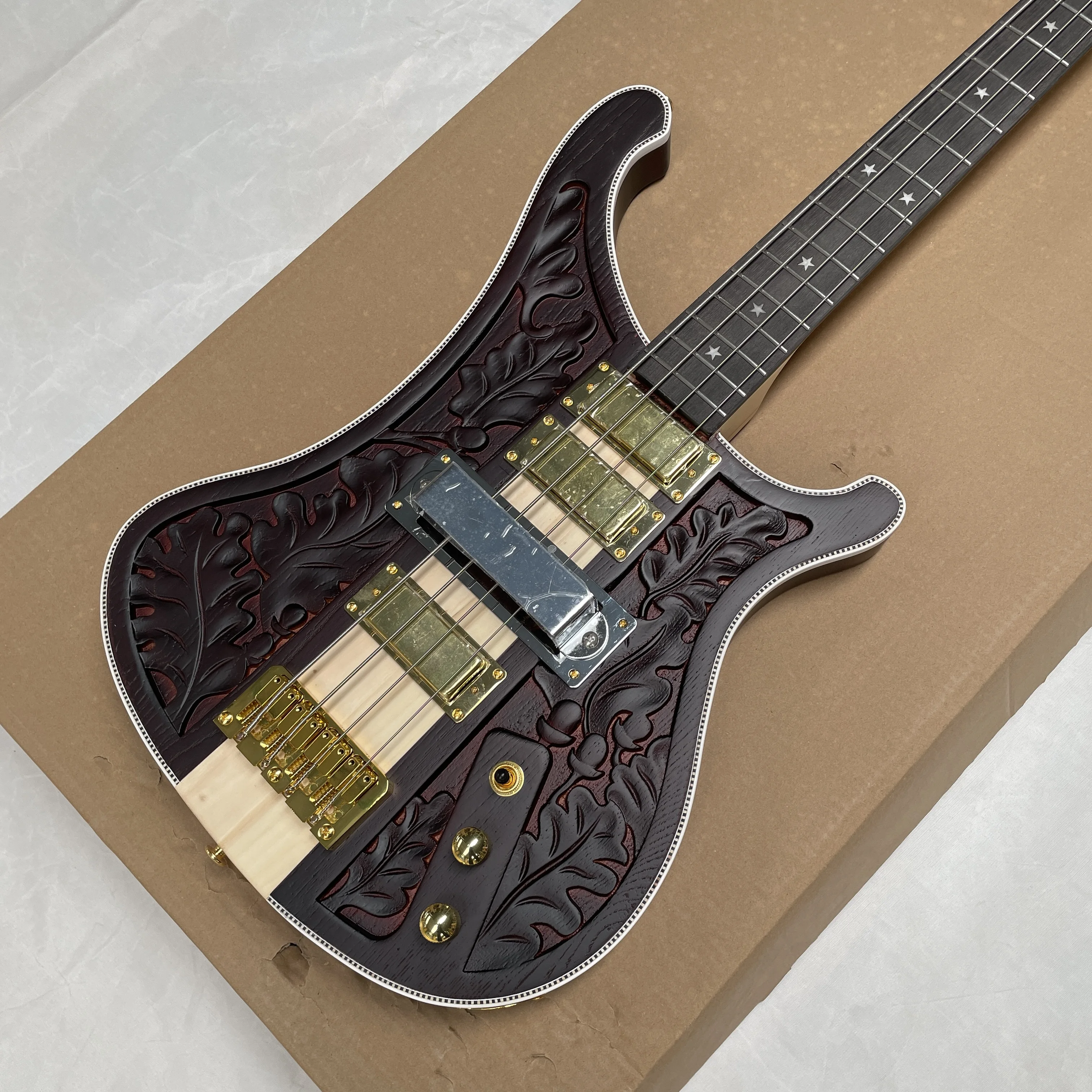 4-string carved electric bass guitar, double-coil pickup full bass sound long sustain guitars, stage performance guitarra
4-string carved electric bass guitar, double-coil pickup full bass sound long sustain guitars, stage performance guitarra