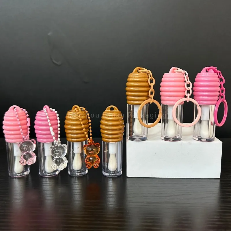 50Pcs Portable 5ml Honey Design Lip Gloss Big Wand Brush Bottle Custom logo Empty Clear Lipstick Tubes with Key Chain
50Pcs Portable 5ml Honey Design Lip Gloss Big Wand Brush Bottle Custom logo Empty Clear Lipstick Tubes with Key Chain