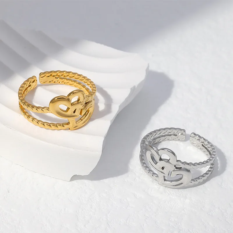 Stainless steel cross heart ring European and American fashion simple opening adjustable 18K gold titanium steel rings for women
Stainless steel cross heart ring European and American fashion simple opening adjustable 18K gold titanium steel rings for women