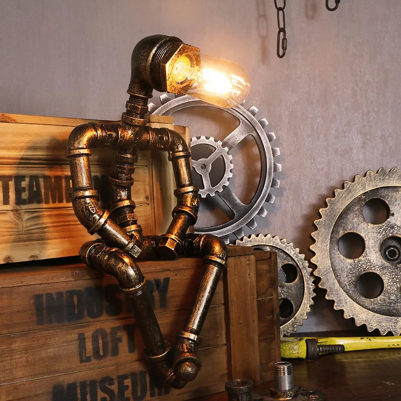 American Style Loft Creative Iron Pipe Industrial Retro Creative Iron Pipe Robot Table Lamp LED Tungsten Filament Beside Lamp
American Style Loft Creative Iron Pipe Industrial Retro Creative Iron Pipe Robot Table Lamp LED Tungsten Filament Beside Lamp