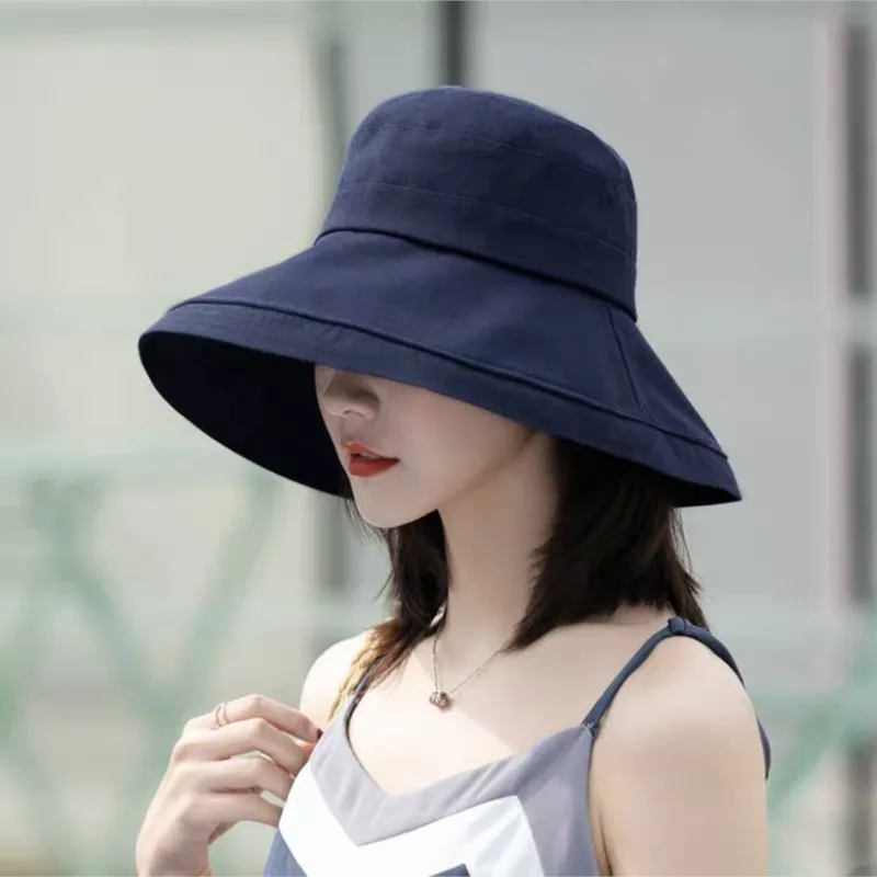 A wide-brimmed fisherman's hat covering the face women's literary sun-protective basin and trendy shade
A wide-brimmed fisherman's hat covering the face women's literary sun-protective basin and trendy shade