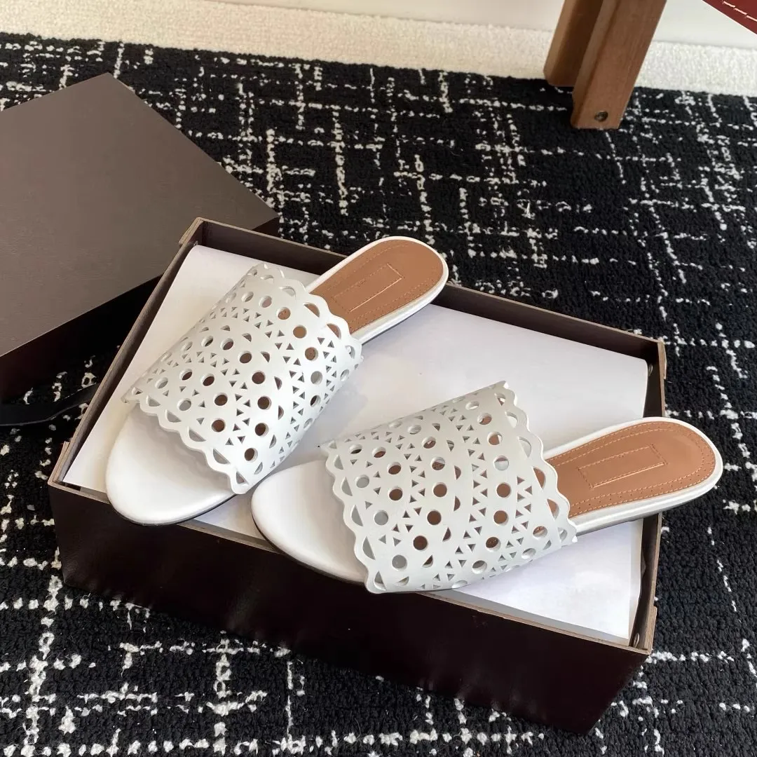 Luxury Carved Out Toe Hollow Leather One Line Slippers for Women's Flat Bottom Roman Leisure Vacation Versatile Cool Slippers
Luxury Carved Out Toe Hollow Leather One Line Slippers for Women's Flat Bottom Roman Leisure Vacation Versatile Cool Slippers