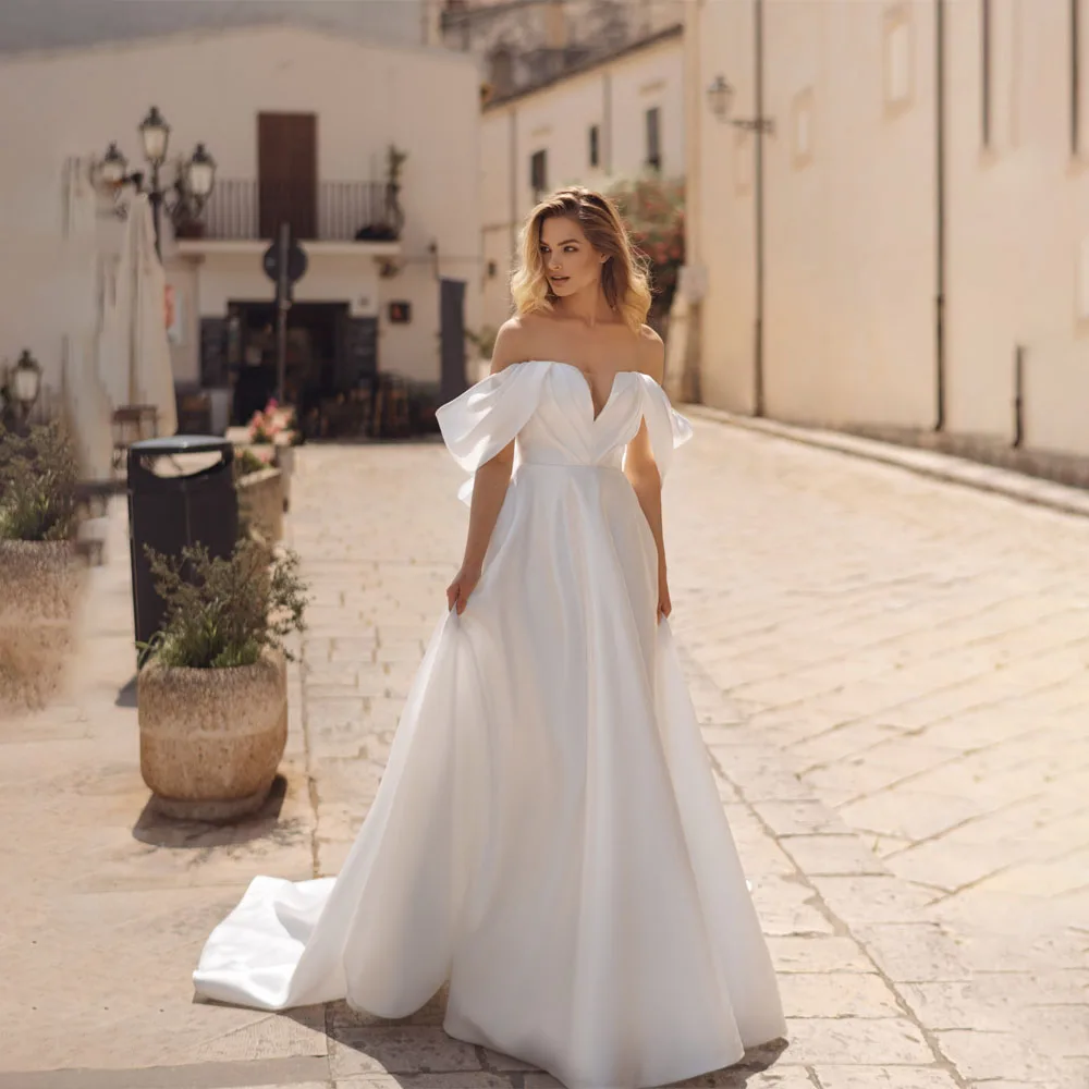 Off Shoulder Pleated Wedding Dresses Simple Satin Sleeveless Wedding Gowns Backless A-line Court Bridal Gown vestido de novia
Off Shoulder Pleated Wedding Dresses Simple Satin Sleeveless Wedding Gowns Backless A-line Court Bridal Gown vestido de novia
