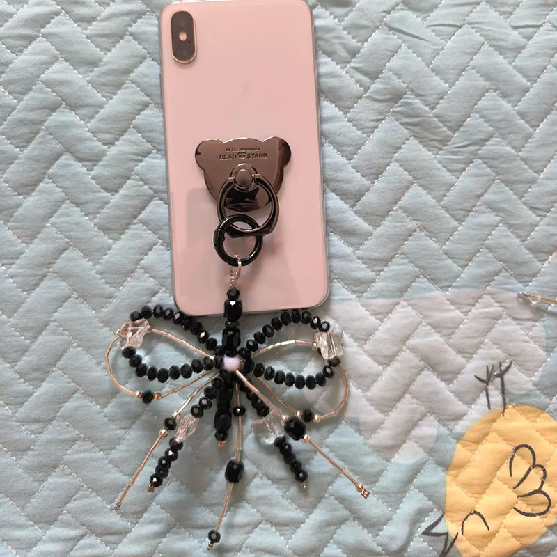 Crystal Bead Cartoon Bear Finger Ring Bowknot Tie Hanging Chain Metal Mobile Phone Bracket Universal Case Adhesive Buckle Stand
Crystal Bead Cartoon Bear Finger Ring Bowknot Tie Hanging Chain Metal Mobile Phone Bracket Universal Case Adhesive Buckle Stand