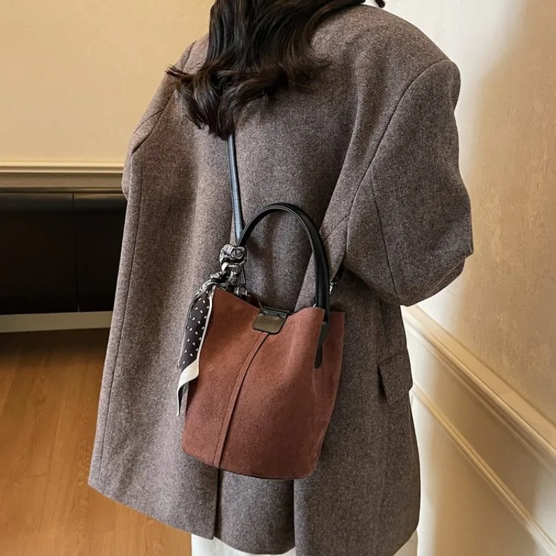 Women's Suede Mini Bucket Crossbody Bag with Top Handle & Scarf Detail, Casual Style for Daily Errands & Weekend Outings Handbag
Women's Suede Mini Bucket Crossbody Bag with Top Handle & Scarf Detail, Casual Style for Daily Errands & Weekend Outings Handbag