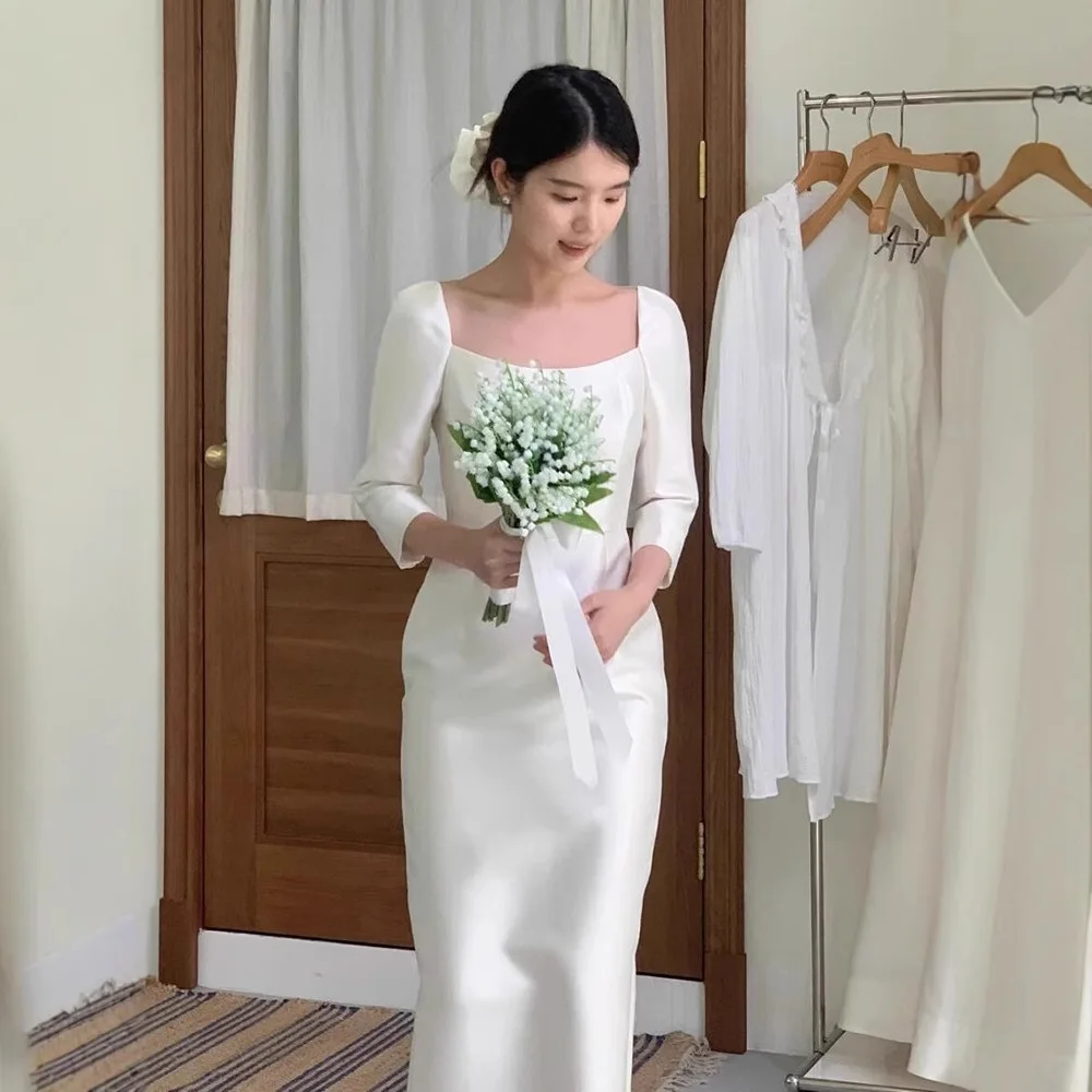 Белое элегантное атласное свадебное платье-футляр в корейском стиле, простое, с рукавами три четверти, длиной до щиколотки, на молнии, вечернее платье для свадебной вечеринки
Белое элегантное атласное свадебное платье-футляр в корейском стиле, простое, с рукавами три четверти, длиной до щиколотки, на молнии, вечернее платье для свадебной вечеринки