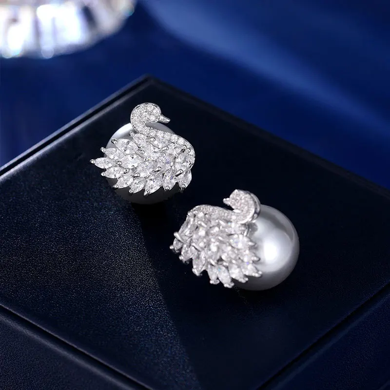 Swan Micro Inlaid Zircon Pearl Light Luxury High-end Feel Earrings S925 Silver Needle Fashion Personality Versatile Ear
Swan Micro Inlaid Zircon Pearl Light Luxury High-end Feel Earrings S925 Silver Needle Fashion Personality Versatile Ear