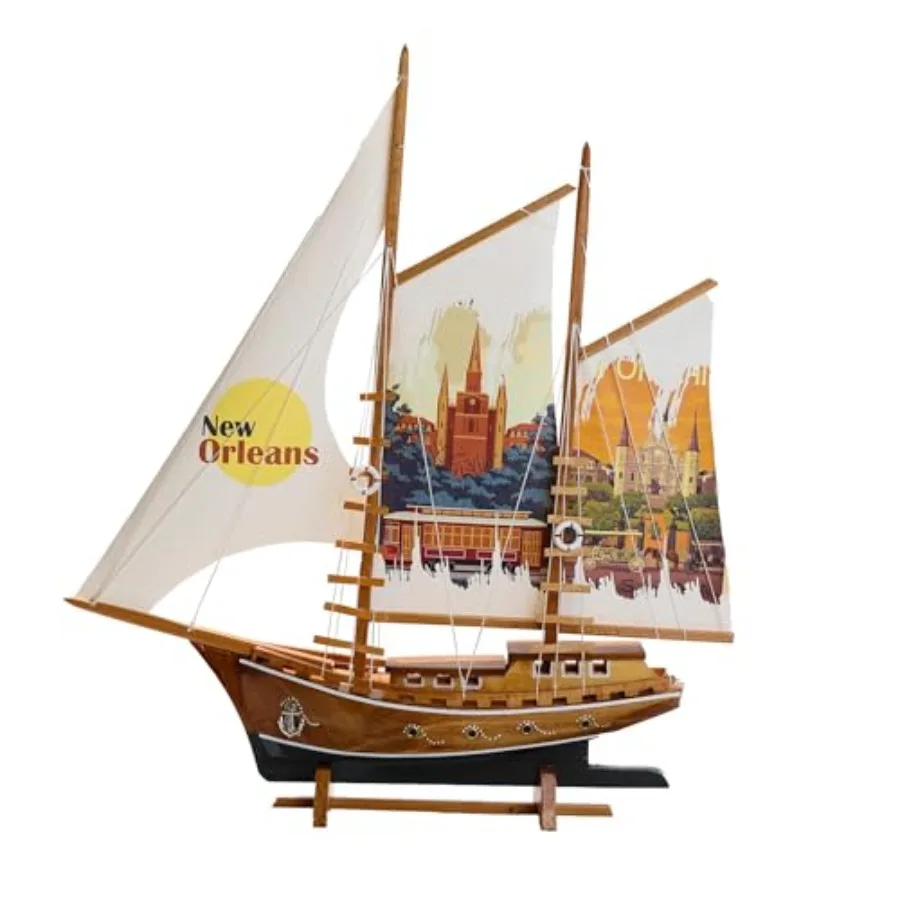 Nautical home decor: handmade wooden sailing yacht model in New Orleans-printed fabric, navy blue with gold accents, artisan-cr
Nautical home decor: handmade wooden sailing yacht model in New Orleans-printed fabric, navy blue with gold accents, artisan-cr