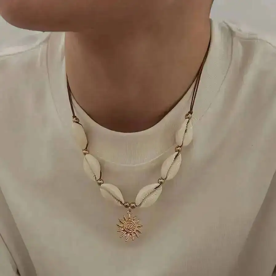 KunJoe Boho Beach Bohemian Conch Wax Thread Choker Necklaces Men Summer Fashion Sun Flower Pendant Chain Handmade Surfer Jewelry
KunJoe Boho Beach Bohemian Conch Wax Thread Choker Necklaces Men Summer Fashion Sun Flower Pendant Chain Handmade Surfer Jewelry