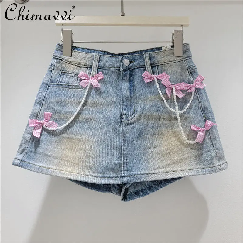 2026 Summer New American Retro Hot Girl Design Heavy Embroidery Bow Denim Skort Women's Fashion Loose Fit Slimming Shorts
2026 Summer New American Retro Hot Girl Design Heavy Embroidery Bow Denim Skort Women's Fashion Loose Fit Slimming Shorts