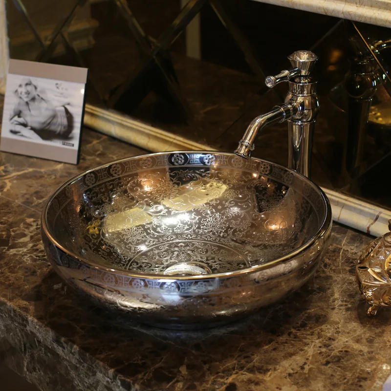 Chinese wash basin sink bathroom sink bowl countertop Ceramic washbasin silver embossment bathroom sink
Chinese wash basin sink bathroom sink bowl countertop Ceramic washbasin silver embossment bathroom sink