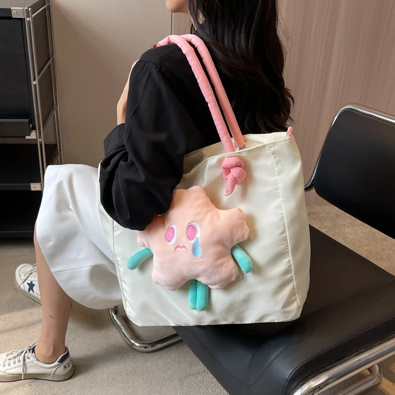 New Cartoon Star Plush Doll Removable Large Capacity Shoulder Bag Student Commuter Bag Versatile Canvas Bag Fashion Tote Bag
New Cartoon Star Plush Doll Removable Large Capacity Shoulder Bag Student Commuter Bag Versatile Canvas Bag Fashion Tote Bag
