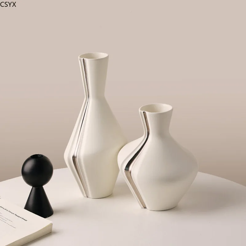 Jingdezhen Ceramics Modern Simple Creative Art Ceramic Vase Living Room Decorative Ornament Decoration Mariage Nordic Vase
Jingdezhen Ceramics Modern Simple Creative Art Ceramic Vase Living Room Decorative Ornament Decoration Mariage Nordic Vase