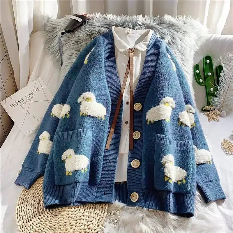 Blue Sheep Cartoon V-Neck Long Sleeve Loose Knitted Sweater Women's Korean Fashion Winter Thick Cardigan For Women 2025
Blue Sheep Cartoon V-Neck Long Sleeve Loose Knitted Sweater Women's Korean Fashion Winter Thick Cardigan For Women 2025