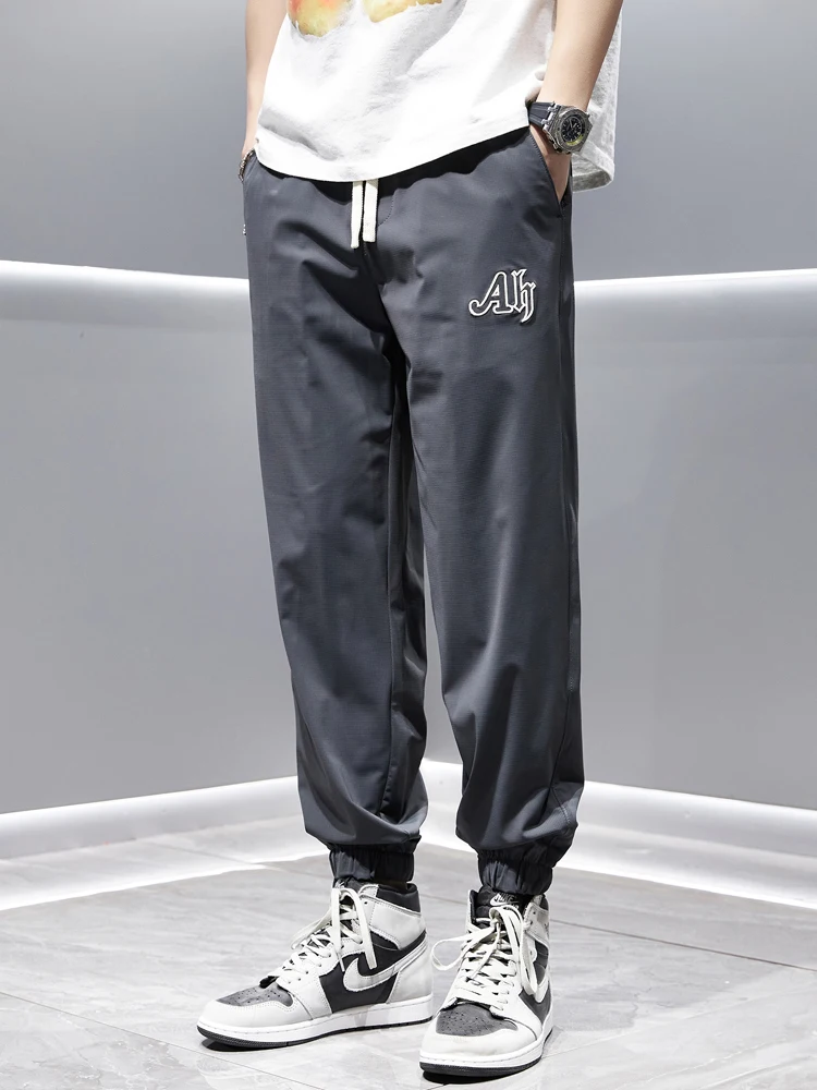 Summer Qui Dry Spor Loose Fit Ice Silk Cuffed Thin Men's Casual Pants Harlan Long Trousers Faionable American Sle
Summer Qui Dry Spor Loose Fit Ice Silk Cuffed Thin Men's Casual Pants Harlan Long Trousers Faionable American Sle