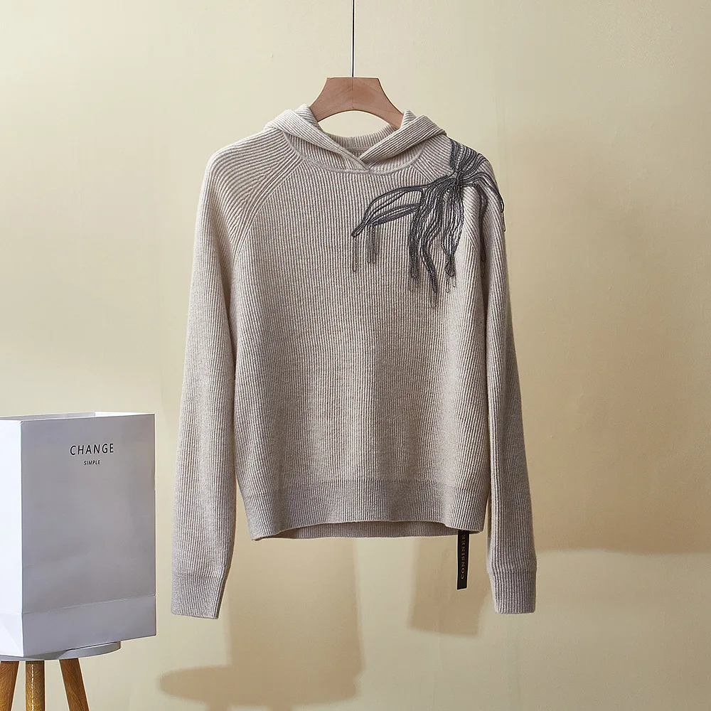 Women's Autumn and Winter New Heavy Industry Bead Chain Tassel Hooded Fashion Sweater Cashmere Sweater Top
Women's Autumn and Winter New Heavy Industry Bead Chain Tassel Hooded Fashion Sweater Cashmere Sweater Top