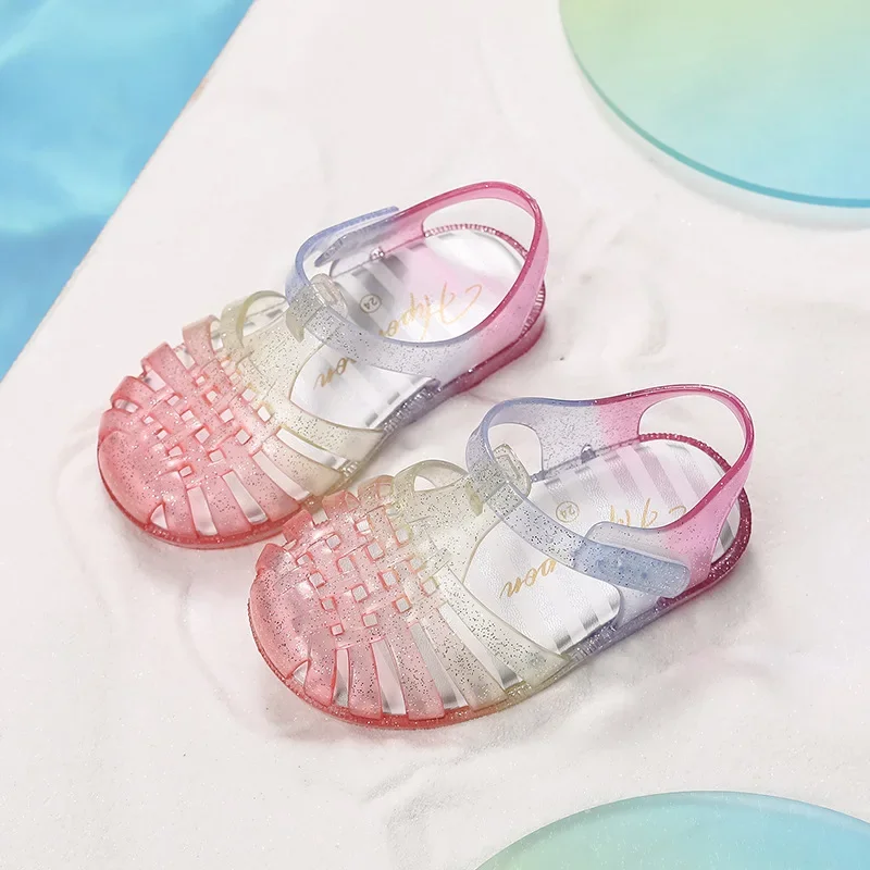 Baby Girls' Sandals 2025 Summer New Rainbow Children's Roman Beach Sandals Headcover Anti Collision Kid's Crystal Jelly Sandals
Baby Girls' Sandals 2025 Summer New Rainbow Children's Roman Beach Sandals Headcover Anti Collision Kid's Crystal Jelly Sandals