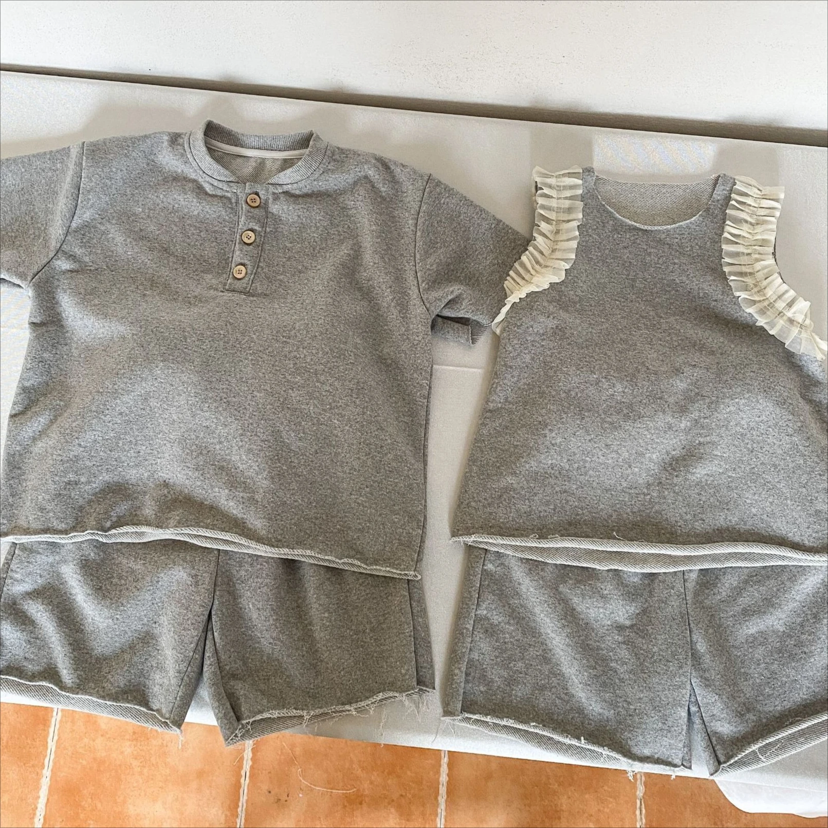 Set 2026 Spring and Summer New Children's Clothing Korean Style Boys and Girls Fashion Sports Vest Shorts Brother and Sister
Set 2026 Spring and Summer New Children's Clothing Korean Style Boys and Girls Fashion Sports Vest Shorts Brother and Sister