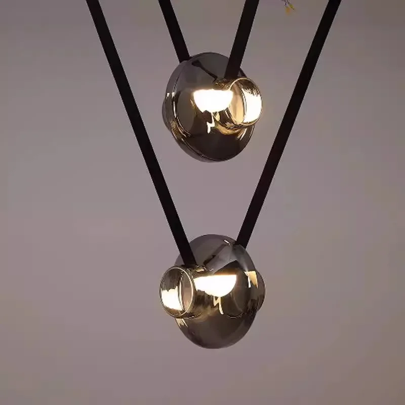 Nordic new restaurant bar chandelier designer personalized creative study model island platform belt glass chandelier
Nordic new restaurant bar chandelier designer personalized creative study model island platform belt glass chandelier