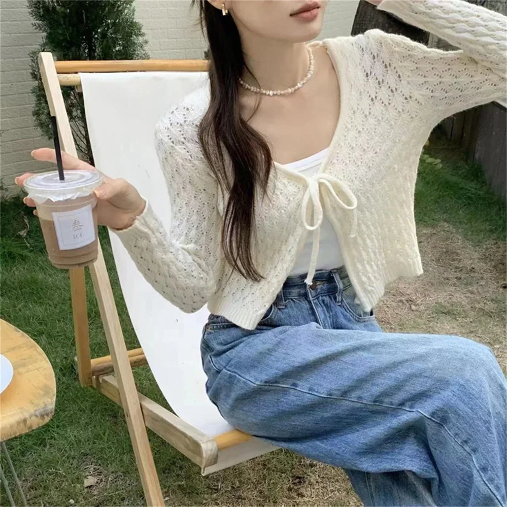 Cardigan Women Autumn Knitted Hollow Out Lace-up V-neck Solid All-match Casual Loose Sweet Korean Style Fashion Simple New Tops
Cardigan Women Autumn Knitted Hollow Out Lace-up V-neck Solid All-match Casual Loose Sweet Korean Style Fashion Simple New Tops