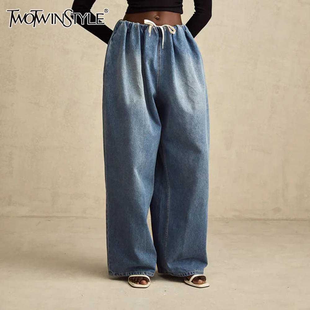 TWOTWINSTYLE Solid Loose Spliced Lace Up Fashion Jeans for Women High Waist Patchwork Pockets Minimalism Pant Female Clothing
TWOTWINSTYLE Solid Loose Spliced Lace Up Fashion Jeans for Women High Waist Patchwork Pockets Minimalism Pant Female Clothing