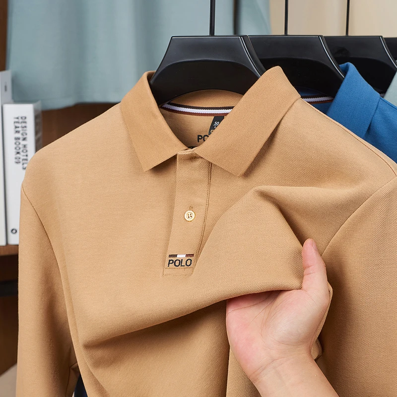 Осенняя мужская рубашка поло высокого качества с длинным рукавом, теплая футболка с утолщенными лацканами, мягкая удобная деловая повседневная классическая мужская одежда
Осенняя мужская рубашка поло высокого качества с длинным рукавом, теплая футболка с утолщенными лацканами, мягкая удобная деловая повседневная классическая мужская одежда