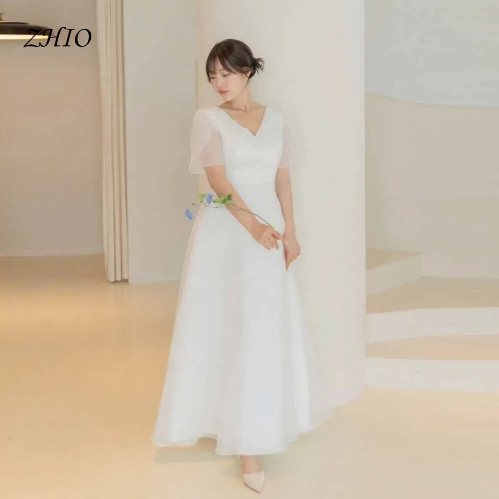 ZHIO Custom Korean Style V Neck A Line Wedding Dress Women Puff Sleeve Simple White Tulle Bridal Gown for Photoshoot
ZHIO Custom Korean Style V Neck A Line Wedding Dress Women Puff Sleeve Simple White Tulle Bridal Gown for Photoshoot