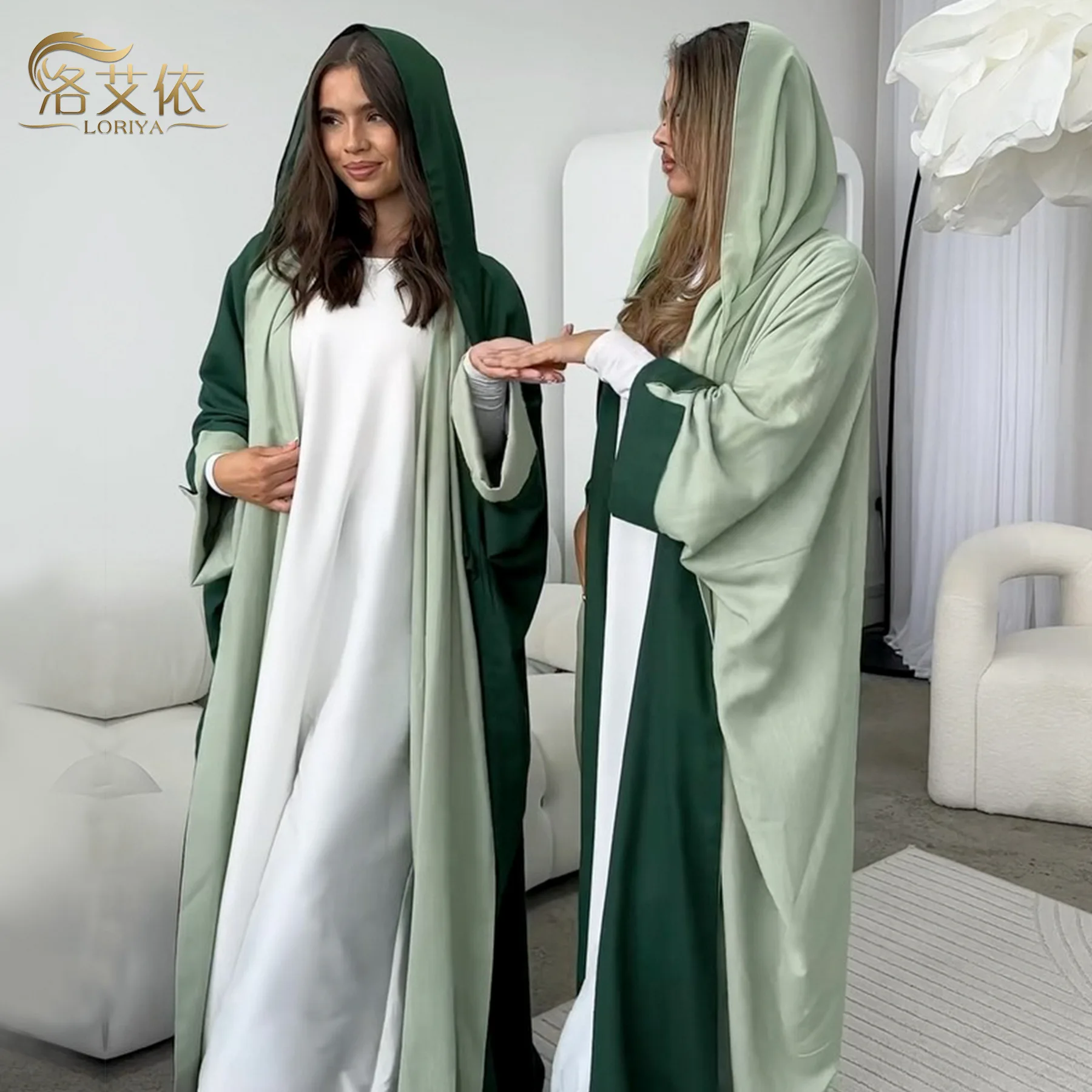 Middle Eastern fashion double-sided reversible cardigan, new style Muslim ethnic women's abaya from Saudi Arabia and Dubai.
Middle Eastern fashion double-sided reversible cardigan, new style Muslim ethnic women's abaya from Saudi Arabia and Dubai.