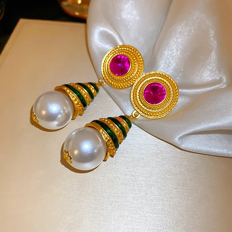 Women Big Baroque Pearl Dangle Earrings
Women Big Baroque Pearl Dangle Earrings