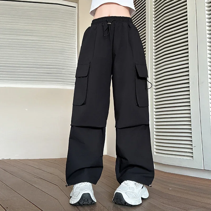Корейские детские однотонные спортивные штаны в стиле Харадзюку, детские летние повседневные черные брюки-карго с карманами для девочек, уличная одежда Y2K, брюки-карго
Корейские детские однотонные спортивные штаны в стиле Харадзюку, детские летние повседневные черные брюки-карго с карманами для девочек, уличная одежда Y2K, брюки-карго