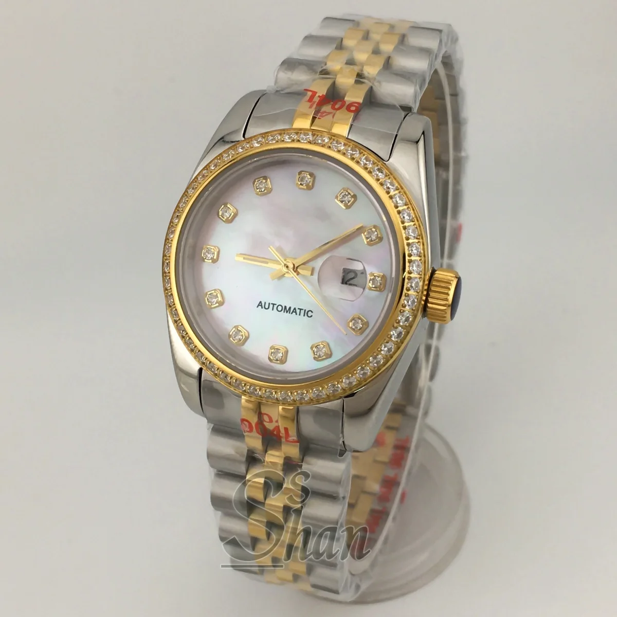 31 мм NH05 Женские автоматические часы с бриллиантовым безелем, сапфировое стекло, розовый перламутровый циферблат, двухцветный золотой браслет, водостойкий 
31 мм NH05 Женские автоматические часы с бриллиантовым безелем, сапфировое стекло, розовый перламутровый циферблат, двухцветный золотой браслет, водостойкий