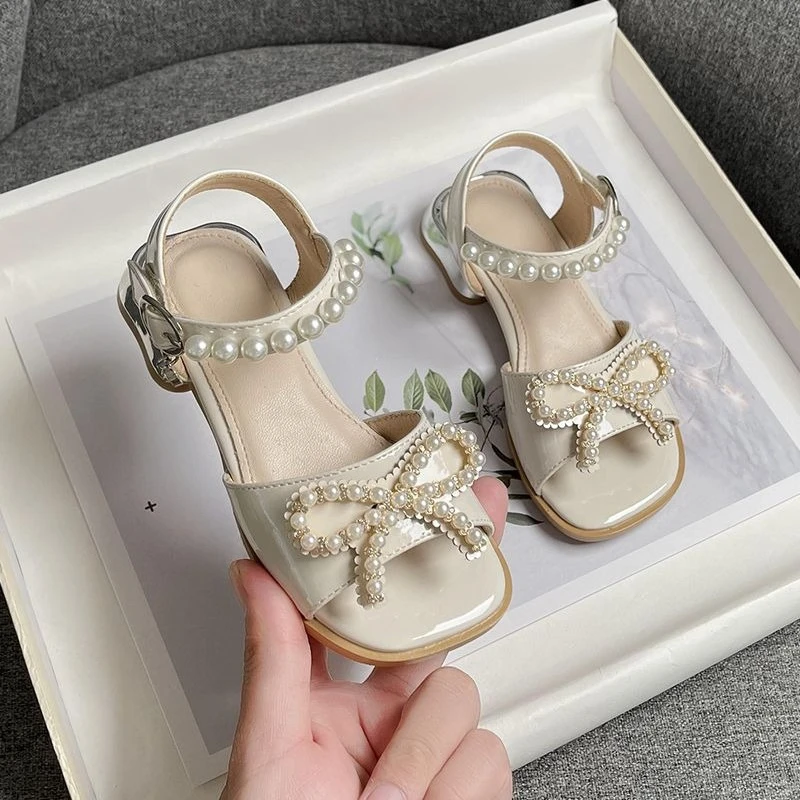 Girls Pearl Bow Princess Shoes Soft Sole Small Heels Summer 2026 New Style
Girls Pearl Bow Princess Shoes Soft Sole Small Heels Summer 2026 New Style